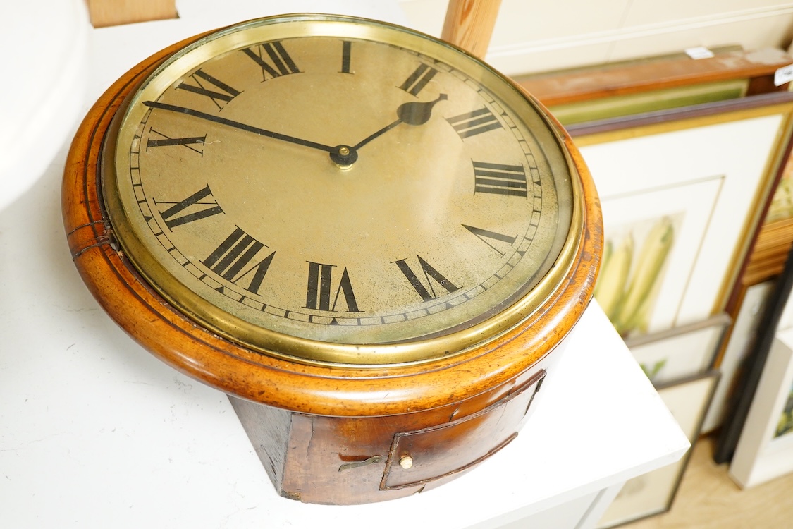 A Victorian wall dial clock case, lacking movement, 37cm in diameter